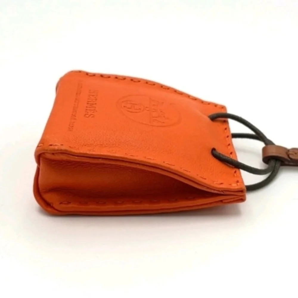 HERMÈS ORANGE LEATHER MINI POUCH BAG CHARM KEY HOLDER + BOX